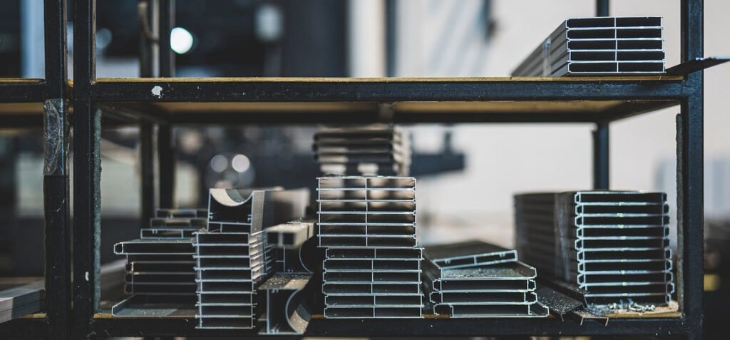 structural steel sections on industrial shelves